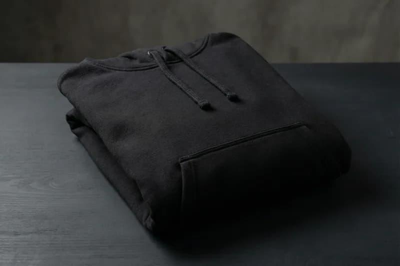 Black pullover hoodie with kangaroo pocket